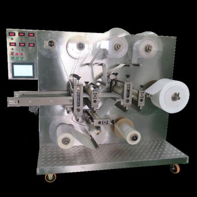 China 1000 kg Rotary Cutter Type KR-QFT-A Steril Wound Patch Packing Machine for Wound Dressing Plaster for sale
