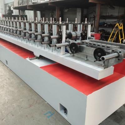 China perno prisionero ajustable de la anchura C U de 40-200m m y rollo de la pista que forma la máquina para el mercado de Chile en venta