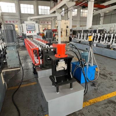 China 1.3mm Top Hat Stud And Track Roll Forming Machine Steel Light Keel Omega Profile for sale