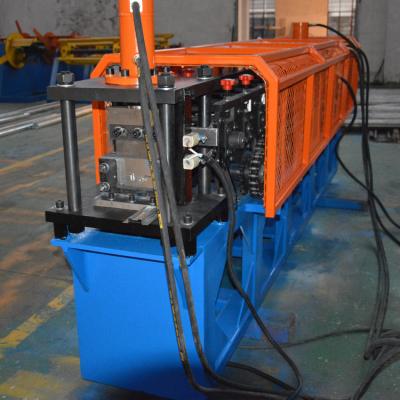 China Pallet Top Hat Roll Forming Machine 0.9mm Galvanized Steel Reinforcement Shelf 12m / Min for sale