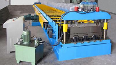 China G550 Galvanized Embossment Steel Flooring Deck Plate Roll Forming Machinery 22KW for sale