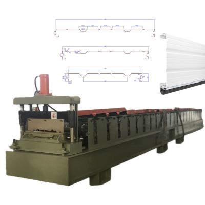 China 530mm 610mm Width Adjustable Sectional Garage Door Panel Roll Forming Machine for sale