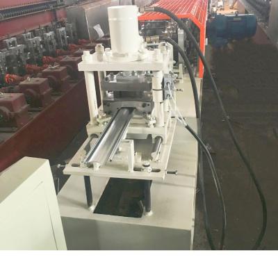 China Metal Shutter Door Slat Shutter Door Roll Forming Machine With 0.7-1.2mm Thickness for sale