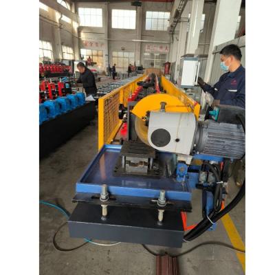 Chine 0.6mm -1.2mm en acier galvanisé Fermeture à rouleaux de porte de fond en acier machine de formage de rouleaux de profil à vendre