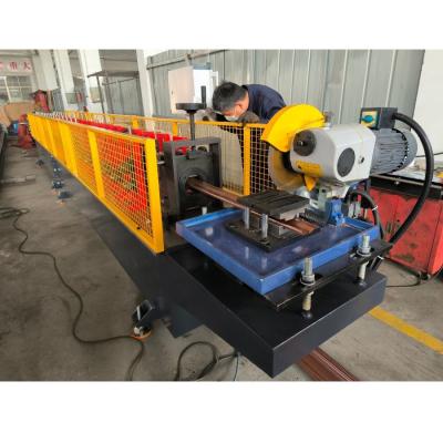 China OEM Customized Galvanized Steel Profile Door Bottom Truck Roll Forming Machine For Rolling Shutter for sale