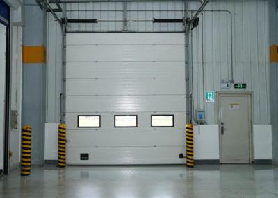 China Insulated Steel Roller Shutter Doors Industrial Sectional Sliding Door Automatic Control for sale