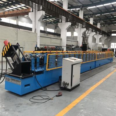 China Perforated Flat Pack Container Beam Roll Forming Machine With Gcr15 Roller 10m/Min Speed for sale