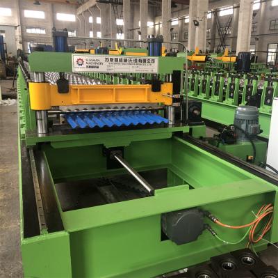 China 1250mm Feeding Width  Servo Cutting Roof Panel Roll Forming Machine for sale