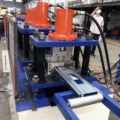 China 1.2mm Thickness 103mm Width Perforated Metal Roller Shutter Door Machine for sale