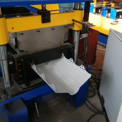 China Hydraulic Punching Ridge Cap Roll Forming Machine Perforation 10m/Min for sale