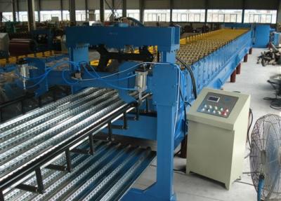 China Rollo perfilado del panel del Decking del piso de la hoja de acero que forma la anchura de alimentación 1220m m de la máquina en venta
