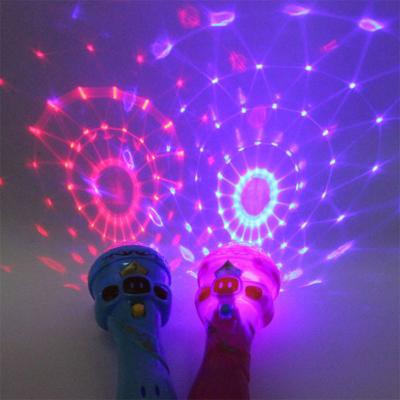 China Customized Kids Toy LED Light Flashing Projection Wireless Microphone Torch Shape Boy Girl Cute Glow Toy for sale