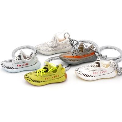 China Customized Sport Shoes Shape 3D Mini Sneaker Promotional Keychain Bulk for sale