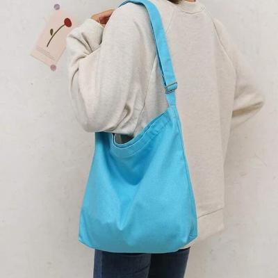 China Canvas Large Capacity Multi Functional Hand Held Shoulder Ladies Handbags Tote Bags for sale