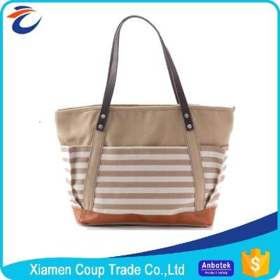 China PU Canvas Material Mummy Diaper Bag / Designer Baby Bags Ergonomically Designed for sale
