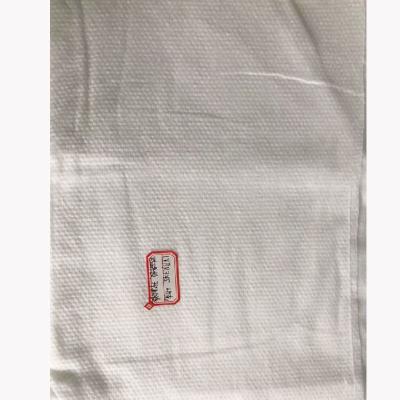 China 75gsm Max Width 2200mm Embossed Spunlace Non Woven Fabric for sale