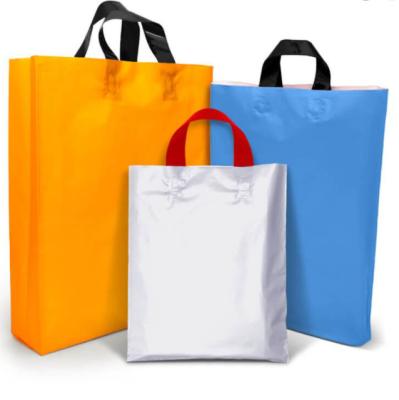 China PVC Plastic Gift Bags 100% Virgin Material Logo Printing Soft Loop Bag for sale