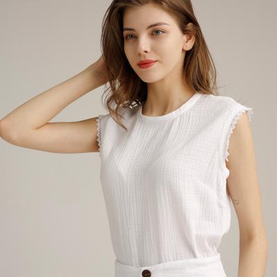 China Los tops blancos sin mangas de las mujeres, cuello redondo, cordón en sin mangas en venta