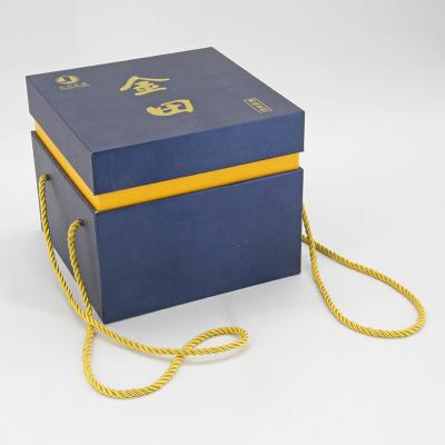 China Boutiquen-kundenspezifische verpackende Papierkasten-Geschenk-Verpackenkästen der hohen Qualität mit den Band-Griffen groß zu verkaufen