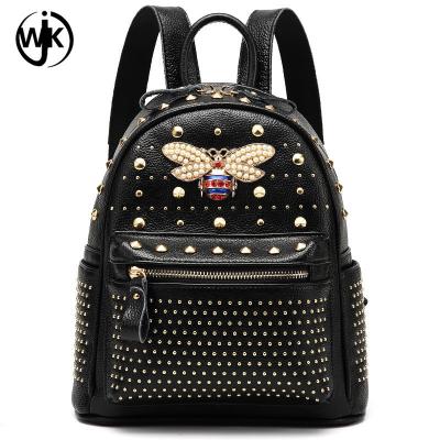 China woman leather Made in China Fashion Teen bee design metal Rivet Genuine Leather l backpack small leather backpack for sale
