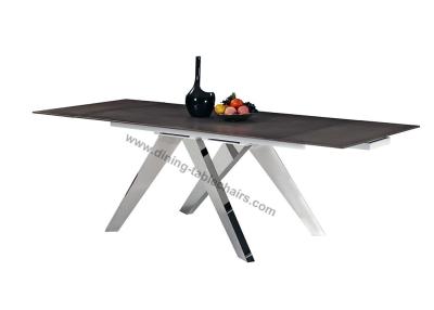 中国 耐熱性流行の長方形の拡張可能なダイニング テーブルの光沢のあるステンレス製の足 販売のため