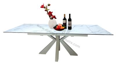 China Square Extension HPL Dining Table Tempered Glass Topped Laser Cutted Legs for sale