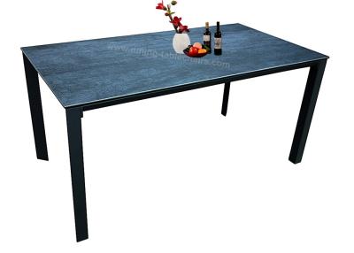 China 1.65 Meter Rectangular Glass Dining Table With Chinese Ceramic Triangular Legs for sale