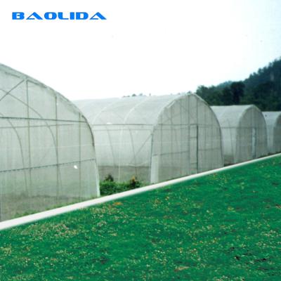 China Strong Tunnel Plastic Film Greenhouse Polyethylene Covering With Irrigation System for sale
