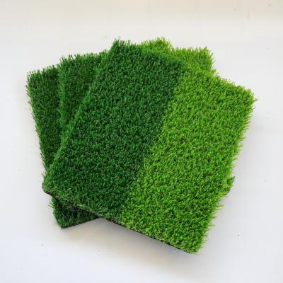 中国 Non Infill Football Artificial Grass Carpets Roll Customized Size 販売のため
