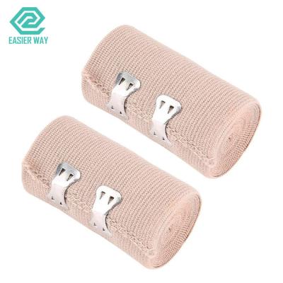 China Skin Colored Medical Dressing Tape Gauze Tape High Elastic Compression Bandage With Clips for sale