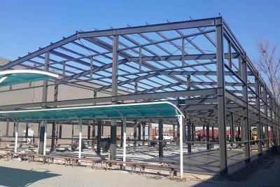China Customized Steel Structure Workshop Prefab Building Sandwich Panel Door en venta