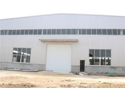 中国 Efficient Storage Solution Steel Structure Warehouse Hot Dip Galvanized With Rolling Door 販売のため