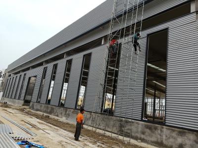 China Colored Q345b Prefabricated Steel Warehouse for sale