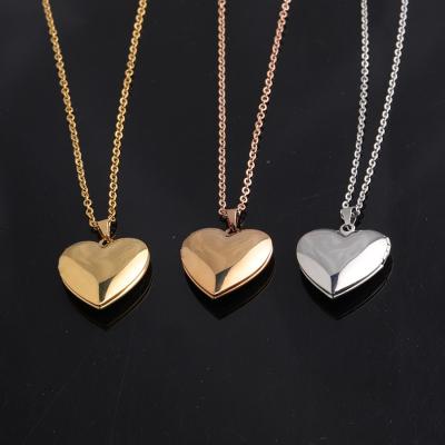 China TRENDY Custom Laser Lettering Luminous Photo Pendant Heart Shape Stainless Steel Finish Pendant Necklace For Woman for sale