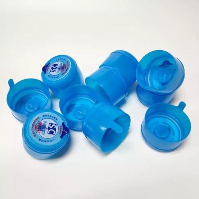 China Food Grade PE 5 Gallon Non Spill Caps Blue Color 55mm Diameter Rubber Liner for sale