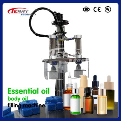 China Squeeze Pump Filling 4 Head Essential Oil Filling Machine With 2 Nozzles for sale