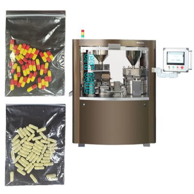 China Máquina automática de llenado de pastillas farmacéuticas Mini máquina de llenado de cápsulas en venta