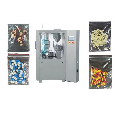 China Máquina de enchimento de pellets farmacêuticos Máquina de enchimento de cápsulas rotativas à venda