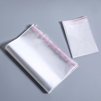 China Self Adhesive Clear Transparent Packaging Printed Cello Plastic Bags Opp en venta