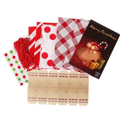 China Heavy Duty Set Flat PE Christmas Plastic Bags With String Ties for sale