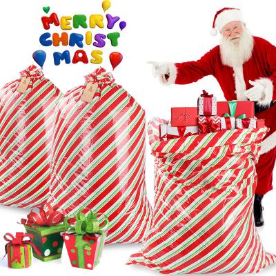China Moisture Proof LDPE Giant Christmas Gift Bags With Tags for sale