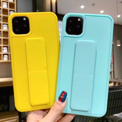 China 2 In 1 Candy Colour Phone Case Shockproof TPU Material Finger Grip Stand for sale