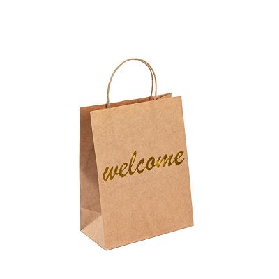 China Customized Gold Stamp Shopping Kraft Paper Packaging Bag With personal Logo for sale