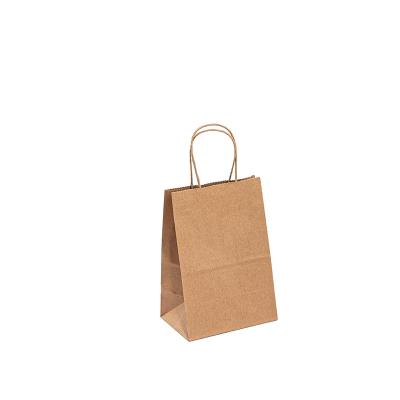 Chine Le sac de achat de empaquetage de papier de Brown emballage de sac de papier de cadeau en gros a adapté aux besoins du client à vendre