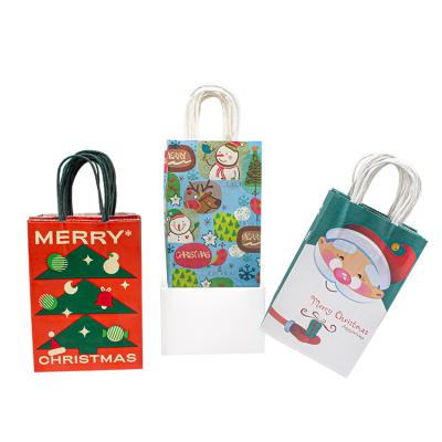 China Customized Christmas Paper Gift Bags Uncoated Lining Paper Twist Rope Handle en venta