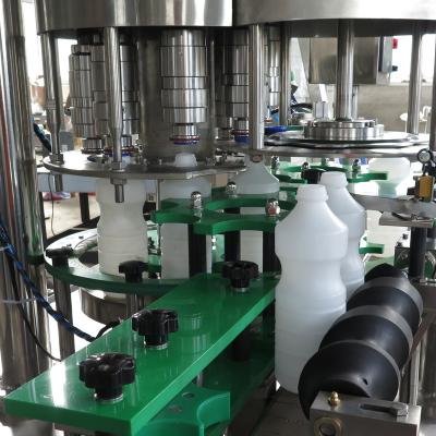 Китай машина 1000ml 70mm автоматическая покрывая для пластиковой аттестации CE нержавеющей стали бутылки продается
