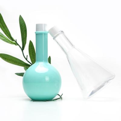 China Customized 270ml 340ml transparent blue food grade material plastic PET creative shape mouthwash bottle for sale