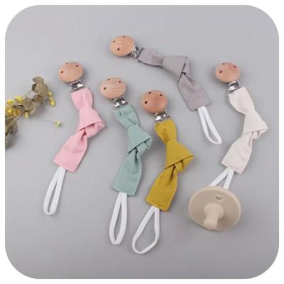 China Beech Pacifier Holder Chain Baby Quilted Cotton Ribbon Pacifier Rope Chain à venda