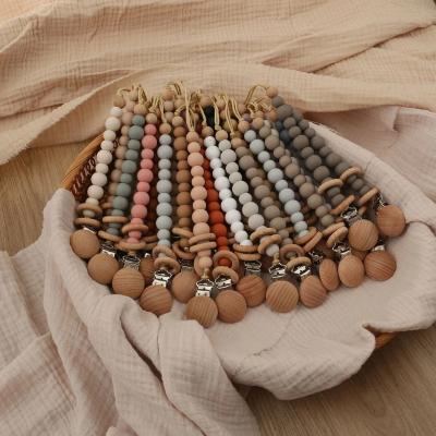 China Wooden Bead Pacifier Chain Clip Soothe Baby Silicone Beads Anti Drop Pacifier Chain à venda