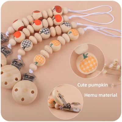 China Geometric Silicone Pacifier Chain Clip Wooden Pacifier Holder en venta